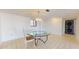 Dining area with glass-top table near laundry at 500 N Osceola Ave # 406, Clearwater, FL 33755
