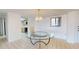 Spacious dining area with a glass table and kitchen access at 500 N Osceola Ave # 406, Clearwater, FL 33755