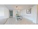Elegant dining room with a chandelier and kitchen views at 500 N Osceola Ave # 406, Clearwater, FL 33755