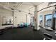 Well-equipped fitness center with various exercise machines and water views at 500 N Osceola Ave # 406, Clearwater, FL 33755