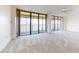 Living room with large windows and water views at 500 N Osceola Ave # 406, Clearwater, FL 33755