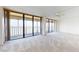 Living room with floor to ceiling windows and water views at 500 N Osceola Ave # 406, Clearwater, FL 33755