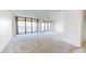 Living room with access to a balcony and water views at 500 N Osceola Ave # 406, Clearwater, FL 33755