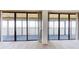 Living area with expansive windows offering scenic water views at 500 N Osceola Ave # 406, Clearwater, FL 33755