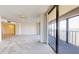 Spacious living room with water view and balcony access at 500 N Osceola Ave # 406, Clearwater, FL 33755