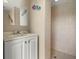 Small bathroom with shower and vanity at 5693 11Th St S, St Petersburg, FL 33705