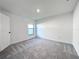 Spacious bedroom with neutral carpeting and large window at 5732 Helmsman Ct, Tampa, FL 33619