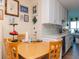 Kitchen with white shaker cabinets, quartz countertops, and a light wood floor at 6025 Shore S Blvd # 409, Gulfport, FL 33707