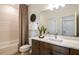 Spa-like bathroom with a soaking tub, modern vanity, and updated fixtures at 6136 Jensen View Ave, Apollo Beach, FL 33572