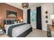 Spacious bedroom with a king-size bed and a view of the lake from the window at 6136 Jensen View Ave, Apollo Beach, FL 33572