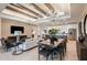 Spacious living room with high ceilings, modern chandelier, and open floor plan at 6136 Jensen View Ave, Apollo Beach, FL 33572