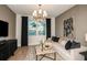 Relaxing living room featuring a comfortable sectional sofa and a large window at 6136 Jensen View Ave, Apollo Beach, FL 33572