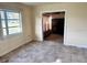 Bright living room with tile floors and view into adjacent room at 6202 S Jones Rd, Tampa, FL 33611