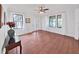 Formal dining room featuring hardwood floors and large windows at 682 Roser Park S Dr, St Petersburg, FL 33701