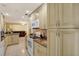 Bright kitchen with granite countertops and ample cabinet space at 7001 Jackson Springs Road, Tampa, FL 33634