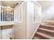 Indoor view of carpeted staircase leading to an upper level at 7029 Oakwood Dr, New Port Richey, FL 34652