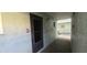 Condo building entryway with door to unit 107 at 801 83Rd N Ave # 107, St Petersburg, FL 33702