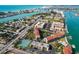 Aerial view of Bridge Hampton Bay complex, highlighting its location and surrounding area at 8711 Blind Pass Rd # 307A, St Pete Beach, FL 33706