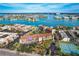 Aerial view of waterfront property showing building location and surrounding area at 8711 Blind Pass Rd # 307A, St Pete Beach, FL 33706