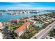Aerial view of Bridge Hampton Bay, highlighting its waterfront location and amenities at 8711 Blind Pass Rd # 307A, St Pete Beach, FL 33706