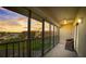 Enjoy evening sunsets from this screened balcony with views of the bay and pond at 8711 Blind Pass Rd # 307A, St Pete Beach, FL 33706