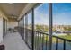 Spacious balcony showcasing scenic views of the surrounding area at 8711 Blind Pass Rd # 307A, St Pete Beach, FL 33706