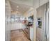 Modern kitchen with stainless steel appliances and granite countertops at 8711 Blind Pass Rd # 307A, St Pete Beach, FL 33706