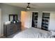 Spacious main bedroom with ample closet space and dresser at 8818 Bay Pointe Dr # 208, Tampa, FL 33615