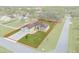 House with a large backyard and a two-car garage, seen from above at 13254 Kitty Rd, Weeki Wachee, FL 34614