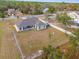 Aerial view showcasing a home's rear and side yard at 13254 Kitty Rd, Weeki Wachee, FL 34614