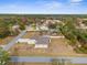 Aerial view of a single-Gathering home with a large backyard and pool at 13254 Kitty Rd, Weeki Wachee, FL 34614