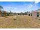 Large backyard with a well-maintained lawn at 13254 Kitty Rd, Weeki Wachee, FL 34614
