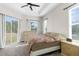 Main bedroom with backyard access and a king-size bed at 13254 Kitty Rd, Weeki Wachee, FL 34614