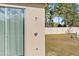 Outdoor shower with glass enclosure and privacy fence at 13254 Kitty Rd, Weeki Wachee, FL 34614