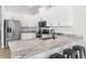 Modern kitchen with stainless steel appliances and granite countertops at 13254 Kitty Rd, Weeki Wachee, FL 34614