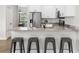 Kitchen features breakfast bar with seating and stainless steel appliances at 13254 Kitty Rd, Weeki Wachee, FL 34614