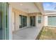 Covered patio with sliding glass doors at 13254 Kitty Rd, Weeki Wachee, FL 34614