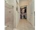 Large bathroom with walk-in shower and closet at 16340 Treasure Point Dr, Wimauma, FL 33598