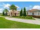 Attractive community clubhouse with landscaping at 16340 Treasure Point Dr, Wimauma, FL 33598