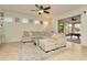 Living Room with sectional sofa and view of lanai at 16340 Treasure Point Dr, Wimauma, FL 33598