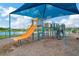 playground with shaded area at 16340 Treasure Point Dr, Wimauma, FL 33598