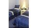 Third bedroom with two twin-size beds at 20040 Gulf Blvd # 302, Indian Shores, FL 33785