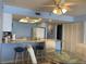 Bright dining area with glass table and seating for four at 20040 Gulf Blvd # 302, Indian Shores, FL 33785