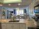 Kitchen with granite countertops and stainless steel appliances at 20040 Gulf Blvd # 302, Indian Shores, FL 33785