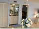 Convenient wet bar with mirrored backsplash and storage at 20040 Gulf Blvd # 302, Indian Shores, FL 33785