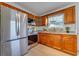 Updated kitchen with stainless steel appliances and wood cabinets at 2942 24Th N Ave, St Petersburg, FL 33713
