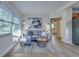 Bright living room featuring a comfy sectional sofa and large artwork at 2942 24Th N Ave, St Petersburg, FL 33713