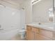 Simple bathroom with single sink vanity and tub at 3117 Bayshore Oaks Dr, Tampa, FL 33611