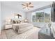 Main bedroom with large window and stylish decor at 3117 Bayshore Oaks Dr, Tampa, FL 33611