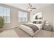 Main bedroom with a ceiling fan and large window at 3117 Bayshore Oaks Dr, Tampa, FL 33611